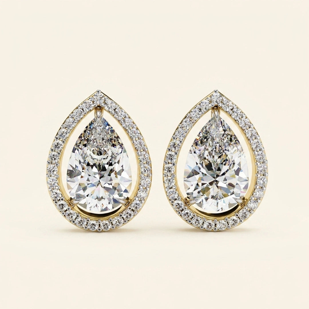 Boucles d'oreilles clous halo poire