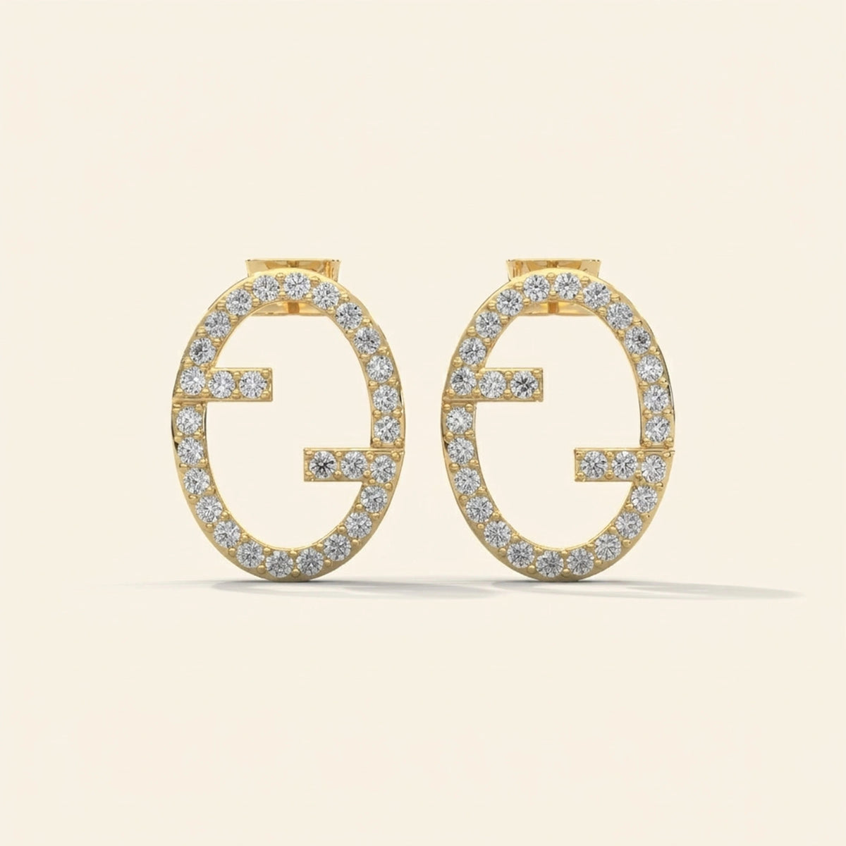 Front view of monogram stud earrings