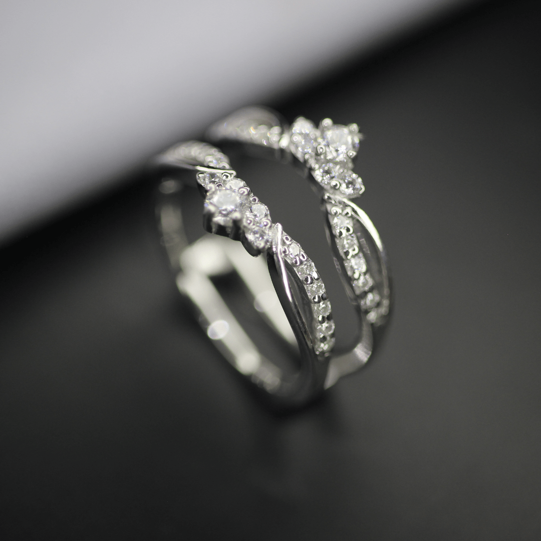 Curved moissnaite ring