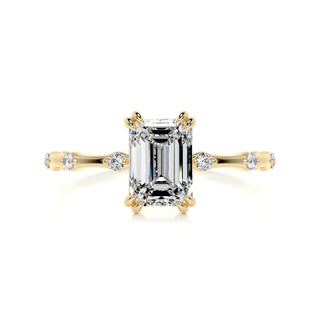 1.50 Carat Emerald Cut Double Prong Solitaire Moissanite Ring in Yellow Gold