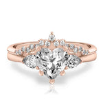 Load image into Gallery viewer, 2.50 Carat Heart Cut Three Stone Moissanite Bridal Set Ring in Rose Gold
