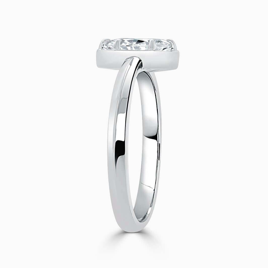 1 carat marquise cut bezel set solitaire moissanite ring in white gold