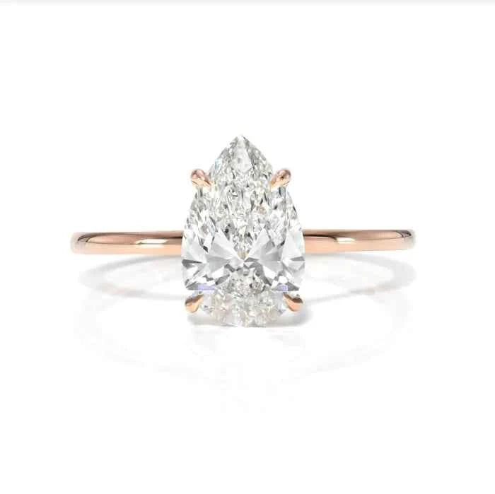 1.50 Ct Pear Shaped Hidden Halo Moissanite Ring in Rose Gold
