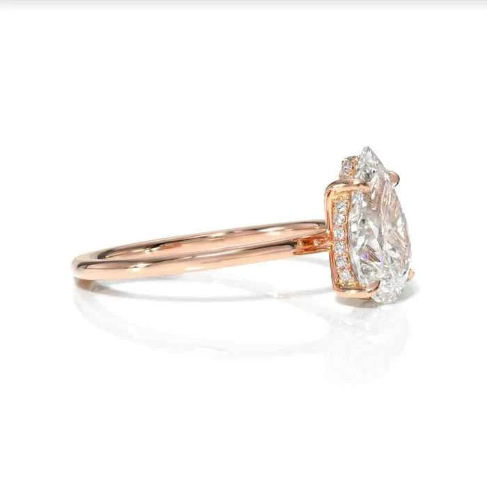 1.50 Ct Pear Shaped Hidden Halo Moissanite Ring in Rose Gold