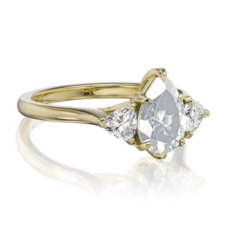 2.20 Ct Pear Shaped Moissanite Three Stone Ring in Yellow Gold