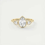 Load image into Gallery viewer, 2 Carat Pear Cut Three Stone Bezel Set Moissanite Ring in Rose Gold
