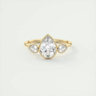 2 Carat Pear Cut Three Stone Bezel Set Moissanite Ring in Rose Gold