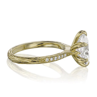 2 Carat Pear Shaped Moissanite Ring in Yellow Gold