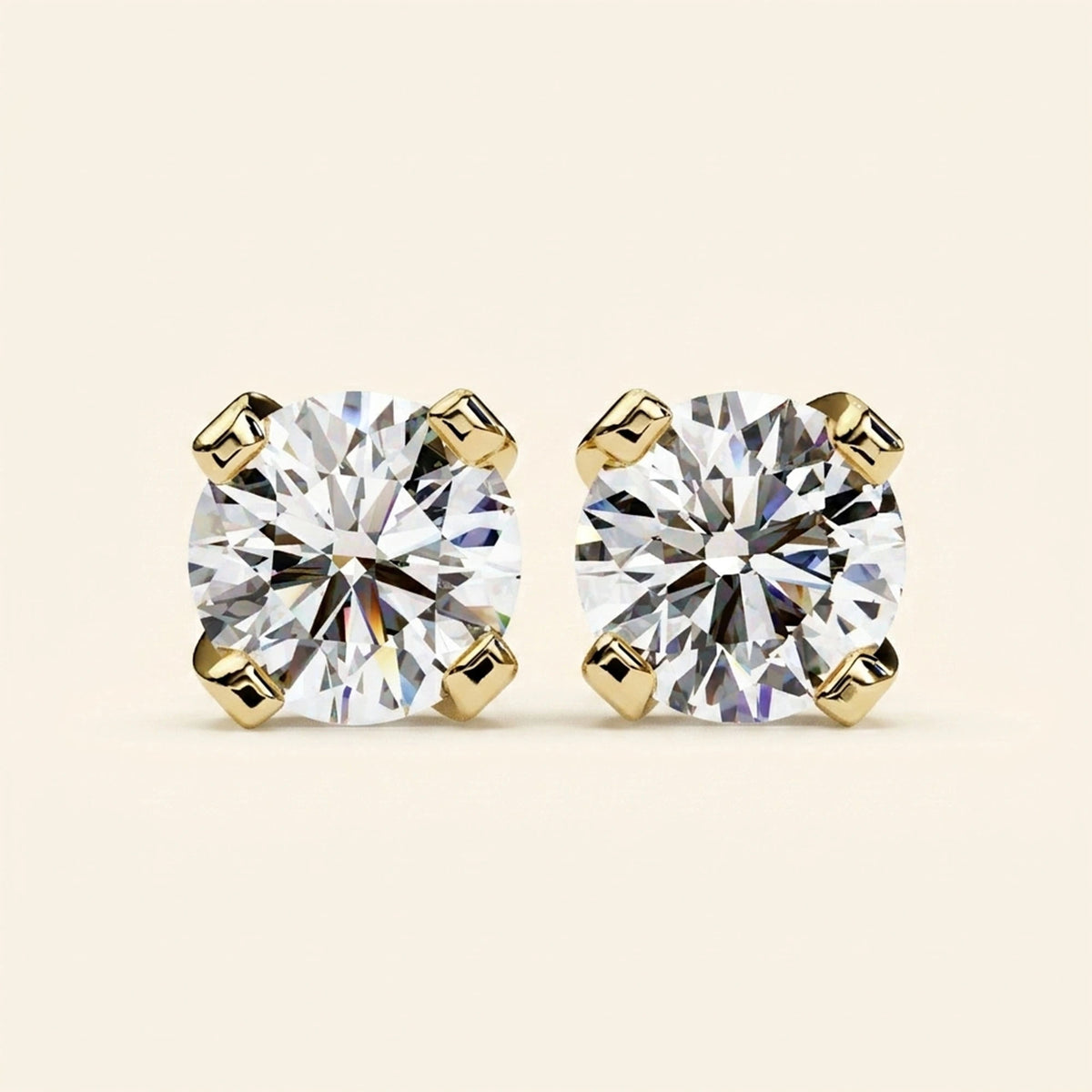 Front view of round created stud earrings