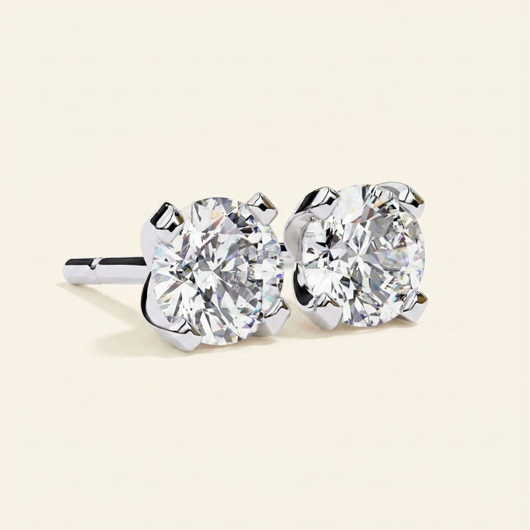 Boucles d'oreilles clous rondes serties