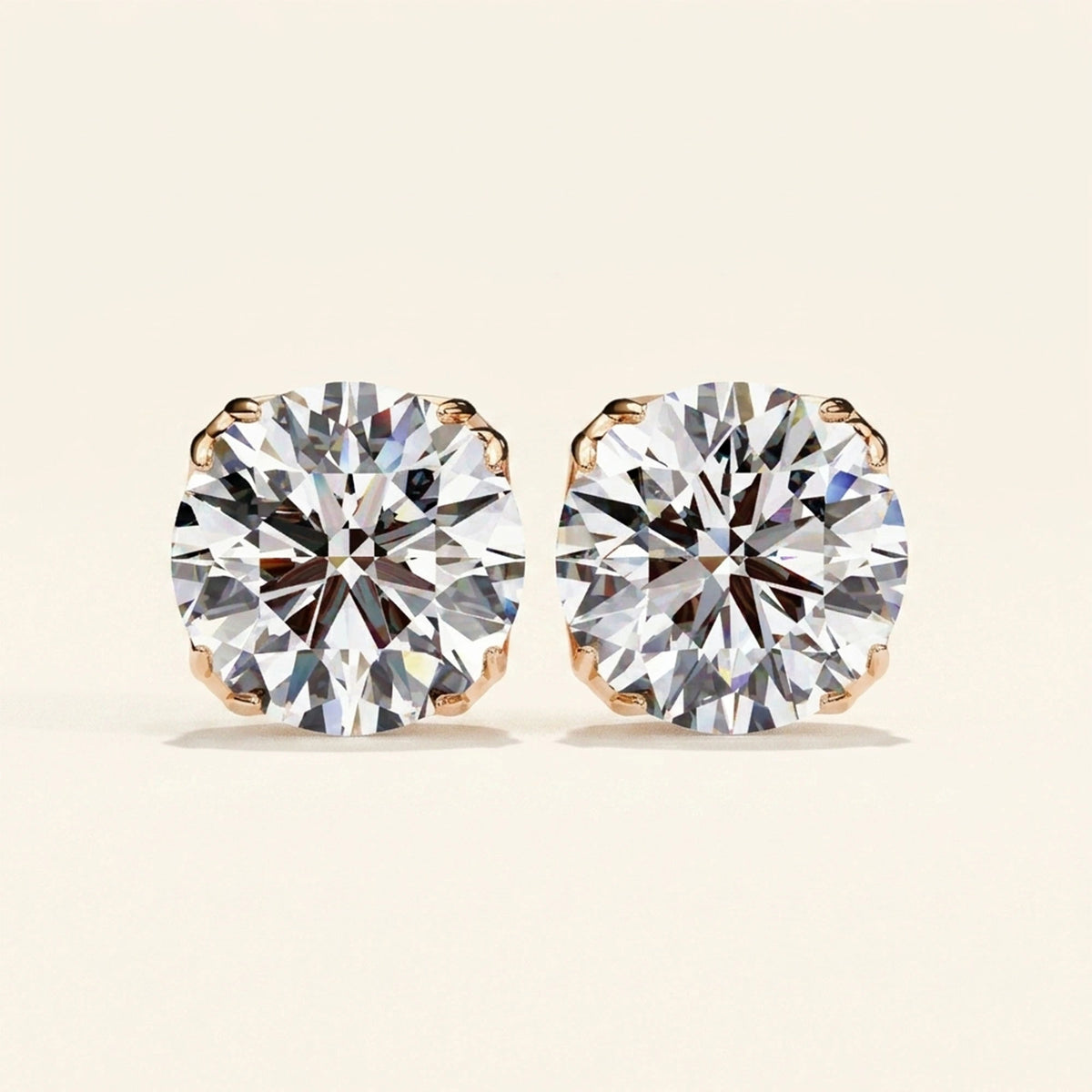 Front view of round stud earrings with double prong settings