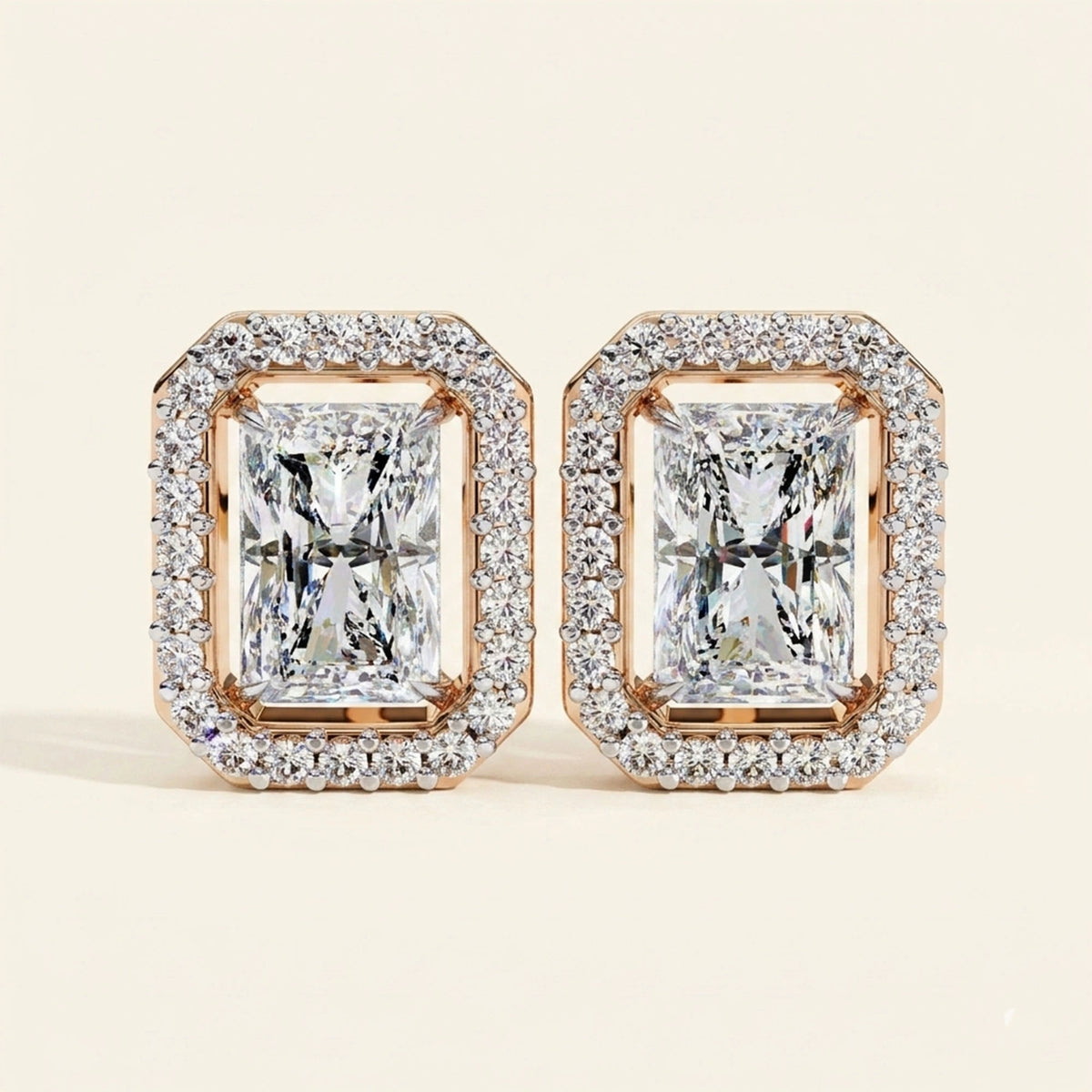 Front view of radiant cut stud earrings with halo design