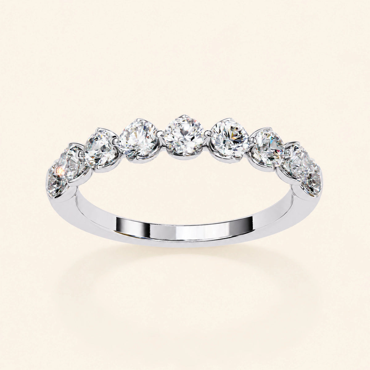 Angle view of round cut half eternity wedding band