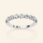 Load image into Gallery viewer, Angle View Of Round Cut Half Eternity Wedding Band
