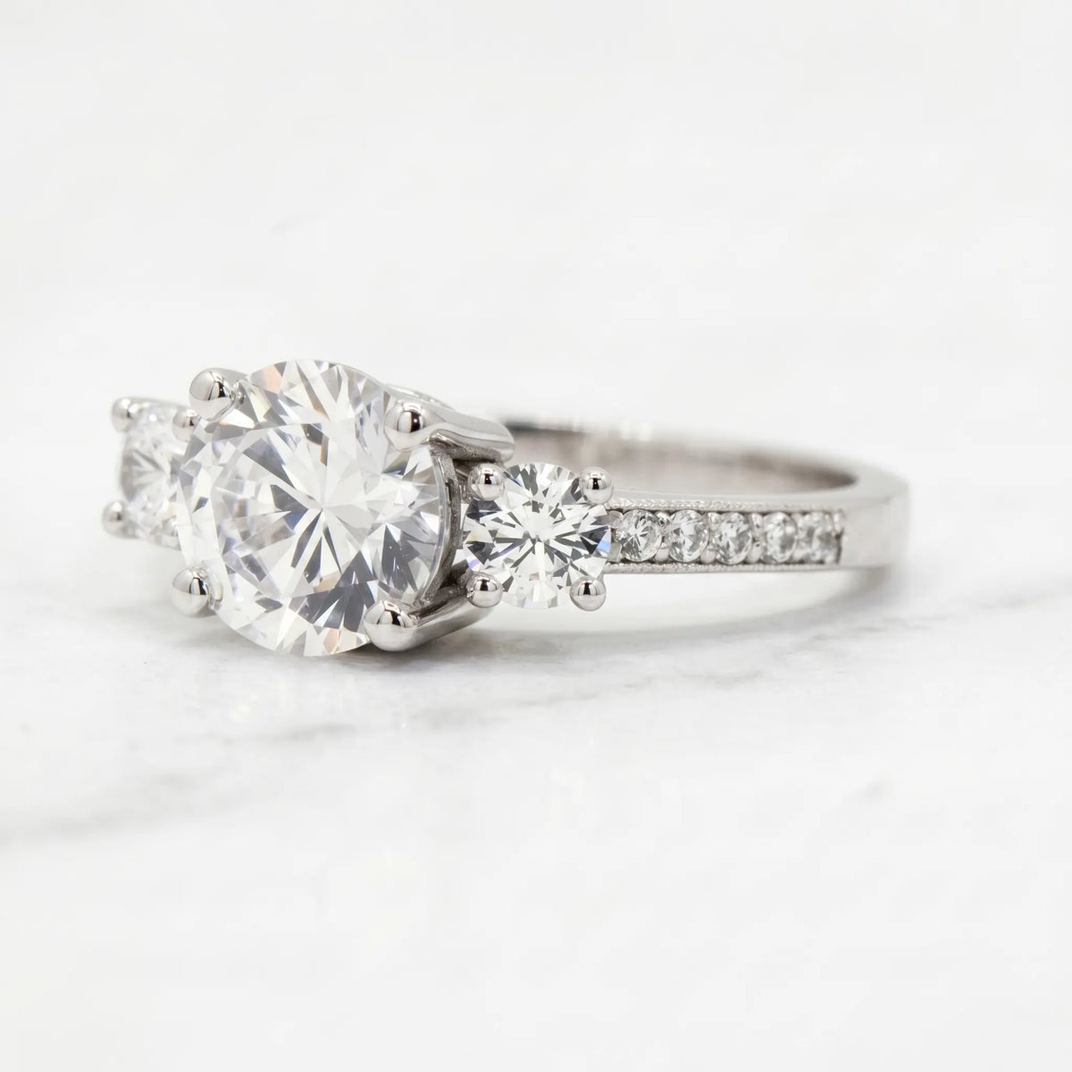 2 ct round three stone moissanite ring in sterling silver