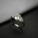 Load image into Gallery viewer, 3 Carat Round And Trillion Cut Moissanite Three Stone Ring
