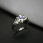 Load image into Gallery viewer, 3 Carat Round And Trillion Cut Moissanite Three Stone Ring
