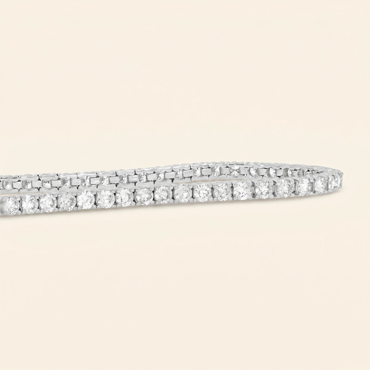 Side view of round shaped tennis bracelet womens