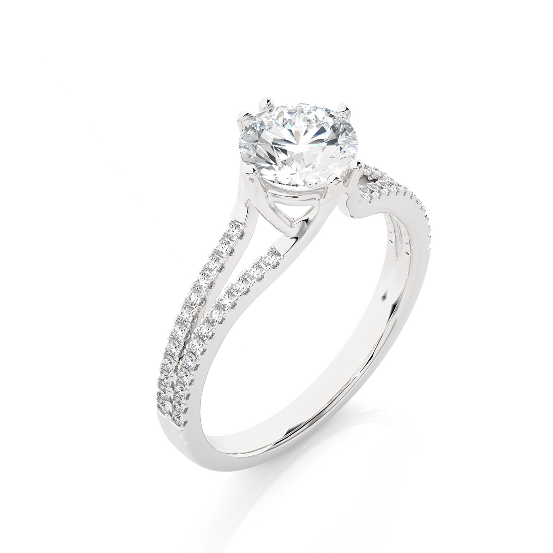 Angled view of 1.40 Ct Round Cut Moissanite Split Shank Engagement Ring In White Gold, showcasing the band and setting.​