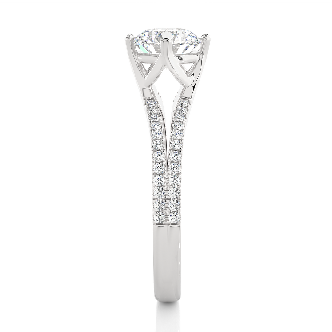 Side profile of 1.40 Ct Round Cut Moissanite Split Shank Engagement Ring In White Gold, highlighting the prong setting.