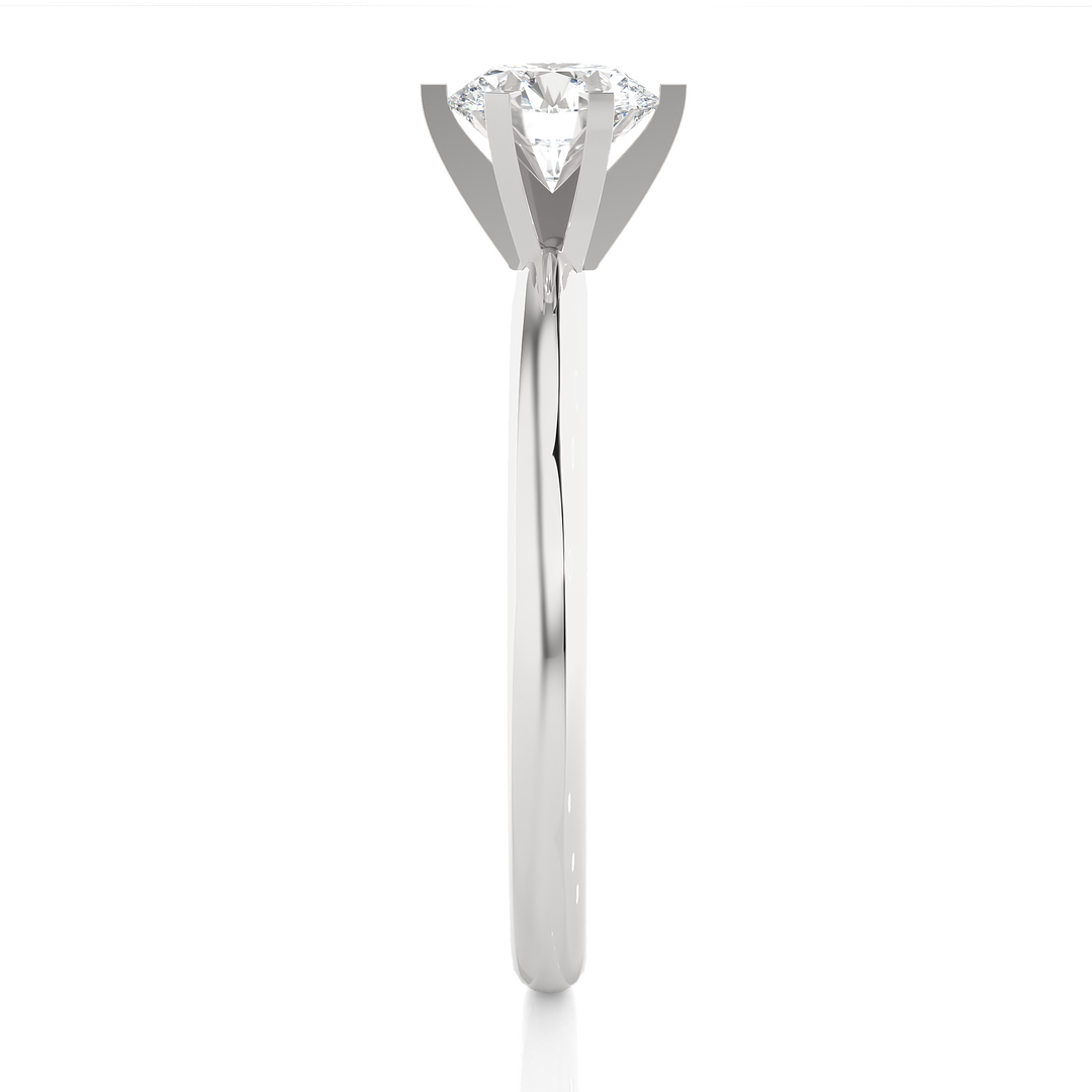 Side profile of 1.50 Carat Round Cut Moissanite Solitaire Engagement Ring In White Gold, highlighting the prong setting.