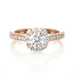 Load image into Gallery viewer, Front view of 1.50 Carat Round Moissanite Halo Engagement Ring In Rose Gold, highlighting the brilliant center Moissanite stone.
