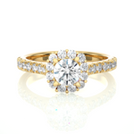 Load image into Gallery viewer, Front view of 1.50 Carat Round Moissanite Halo Engagement Ring In Yellow Gold, highlighting the brilliant center Moissanite stone.
