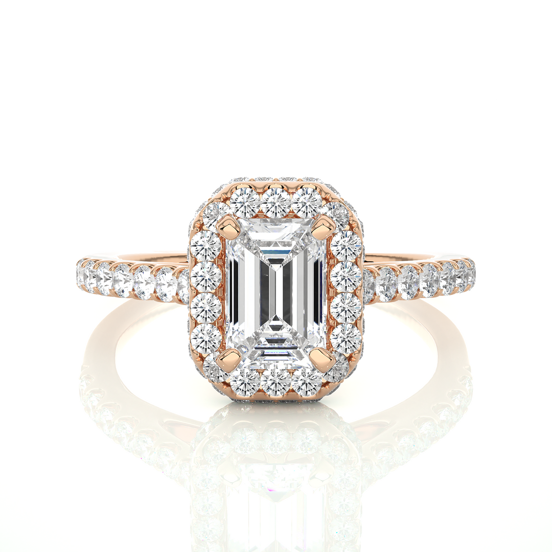 Front view of 1.50 Ct Emerald Cut Moissanite Halo Engagement Ring In Rose Gold, highlighting the brilliant center Moissanite stone.