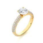 Load image into Gallery viewer, Angled view of 1.50 Ct Moissanite Engagement Ring With Three Row Accents In Yellow Gold, showcasing the band and setting.​
