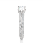 Load image into Gallery viewer, Side profile of 1.50 Ct Round Moissanite Split Shank Engagement Ring In White Gold, highlighting the prong setting.
