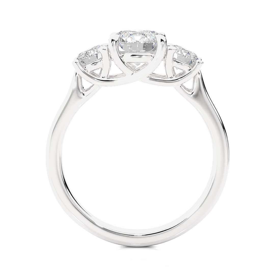 Side profile of 1.50 Ct Round Moissanite Three Stone Engagement Ring in White Gold, highlighting the brilliant center moissanite stone., highlighting the prong setting.
