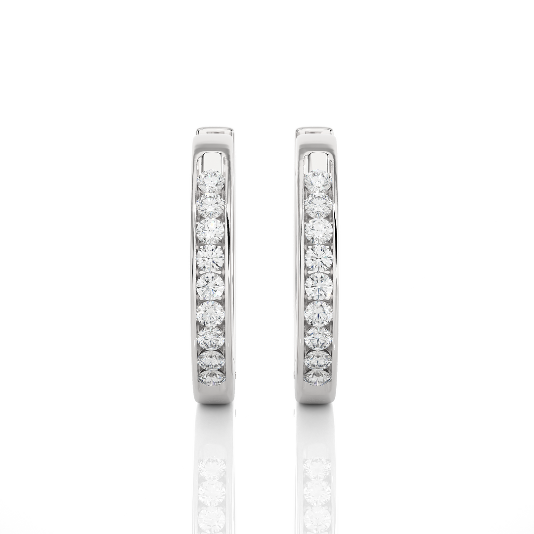Front View of 1 Carat Round Moissanite Channel Set Hoop Earrings In White Gold, shown from the front for full sparkle.