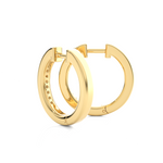 Load image into Gallery viewer, Angled view of 1 Carat Round Moissanite Channel Set Hoop Earrings In Yellow Gold, showing brilliance and curved shape.
