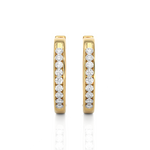 Load image into Gallery viewer, Front View of 1 Carat Round Moissanite Channel Set Hoop Earrings In Yellow Gold, shown from the front for full sparkle.
