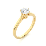Load image into Gallery viewer, Angled view of 1 Carat Round Moissanite Solitaire Engagement Ring In Yellow Gold, showcasing the band and setting.​

