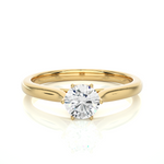 Load image into Gallery viewer, Front view of 1 Carat Round Moissanite Solitaire Engagement Ring In Yellow Gold, highlighting the brilliant center moissanite stone.

