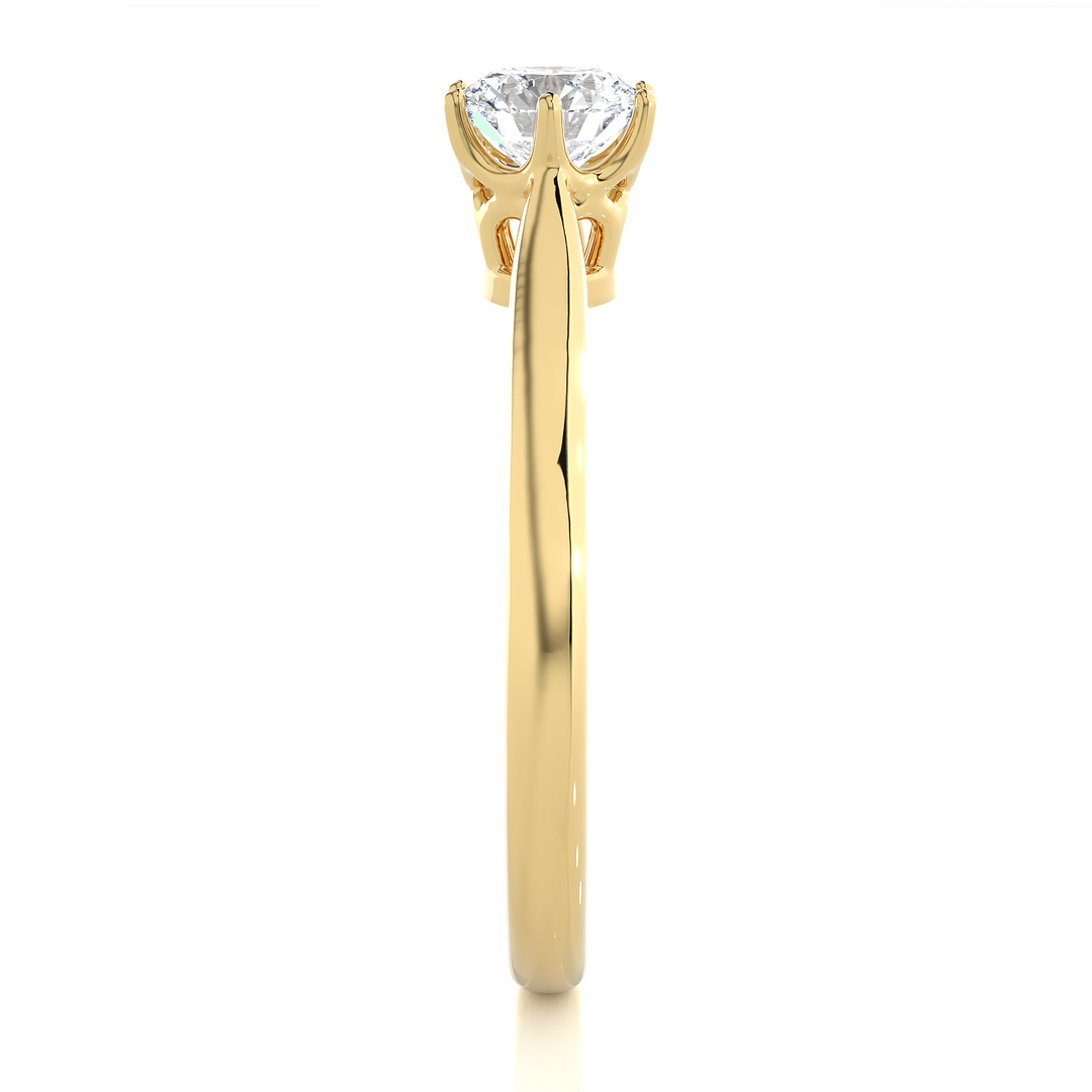 Side profile of 1 Carat Round Moissanite Solitaire Engagement Ring In Yellow Gold, highlighting the prong setting.