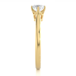 Load image into Gallery viewer, Side profile of 1 Carat Round Moissanite Solitaire Engagement Ring In Yellow Gold, highlighting the prong setting.
