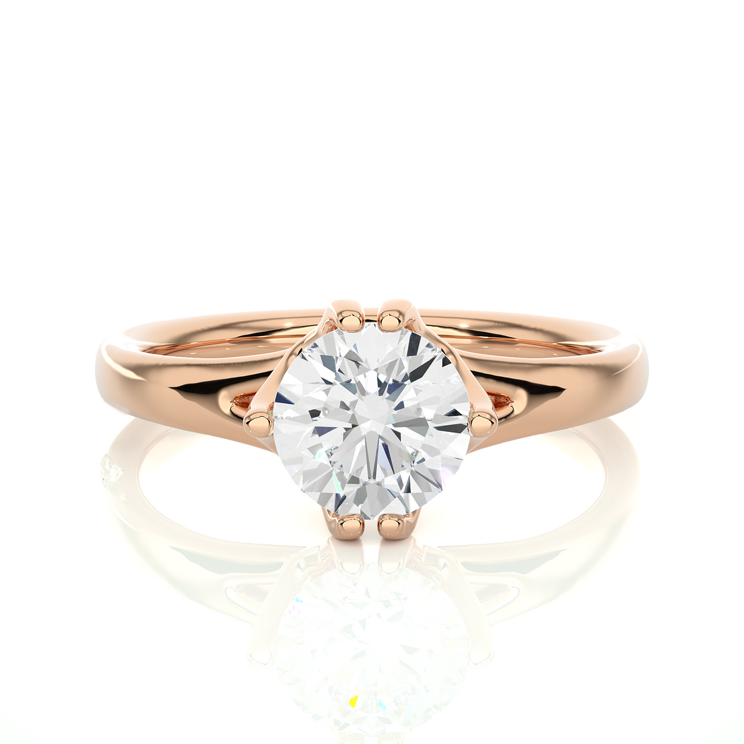 Front view of 1 Carat Round Moissanite Split Shank Solitaire Engagement Ring In Rose Gold, highlighting the brilliant center moissanite stone.
