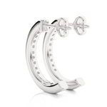 Load image into Gallery viewer, angled view of 1 Carat Round Shape Moissanite C-Hoop Earrings In White Gold, with bright sparkle in channel setting.
