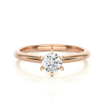 Load image into Gallery viewer, Front view of 1 Carat Six Prong Solitaire Moissanite Ring in Rose Gold, highlighting the brilliant center moissanite stone.
