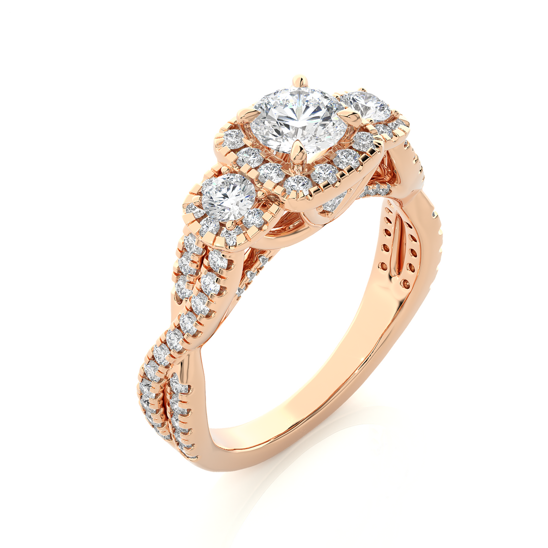 Angled view of 2.50 Ct Round Moissanite Three Stone Halo Engagement Ring In Rose Gold, showcasing the band and setting.​
