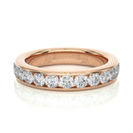 Load image into Gallery viewer, 2.70 Mm Channel Set Round Stone Moissanite Band In Rose Gold
