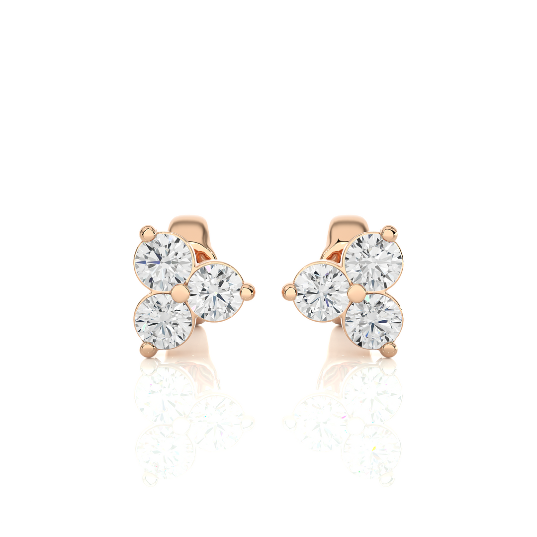 Front view of 2 Carat Round Cut Moissanite Three Stone Stud Earrings In Rose Gold, showing full sparkle.