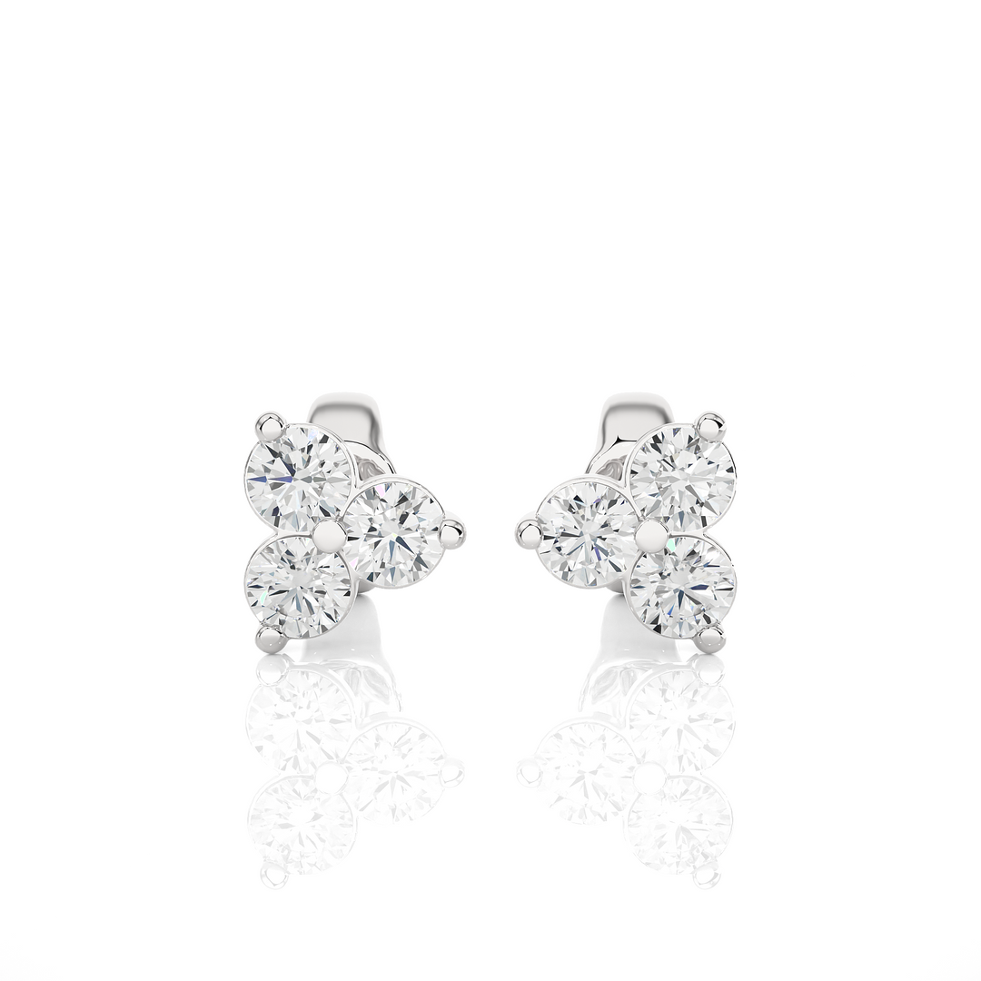 Front view of 2 Carat Round Cut Moissanite Three Stone Stud Earrings In White Gold, showing full sparkle.