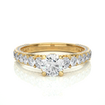 Load image into Gallery viewer, Front view of 2 Ct Bridge Set Moissanite Engagement Ring With Accent In Yellow Gold, highlighting the brilliant center moissanite stone.
