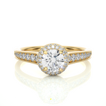 Load image into Gallery viewer, Front view of 2 Ct Round Cut Moissanite Halo Engagement Ring In Yellow Gold, highlighting the brilliant center Moissanite stone.
