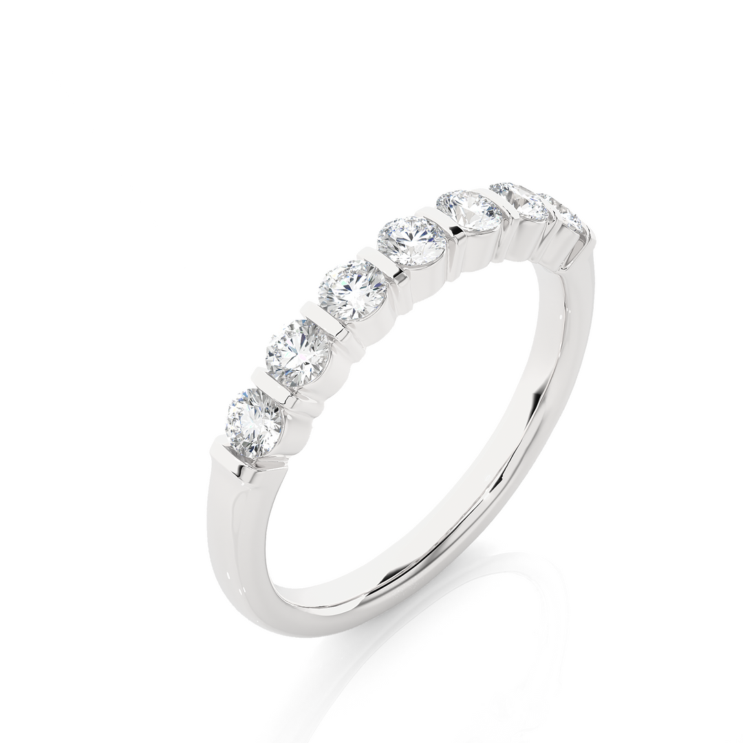 0.5 Ct Round Moissanite Seven Stone Wedding Band In White Gold