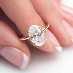 Load image into Gallery viewer, 2.30 Carat Oval Cut Moissanite Hidden Halo Engagement Ring in Yellow Gold
