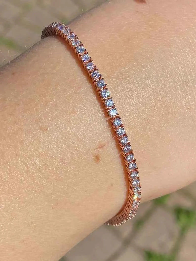 3 ct round shaped moissanite tennis bracelet in rose gold